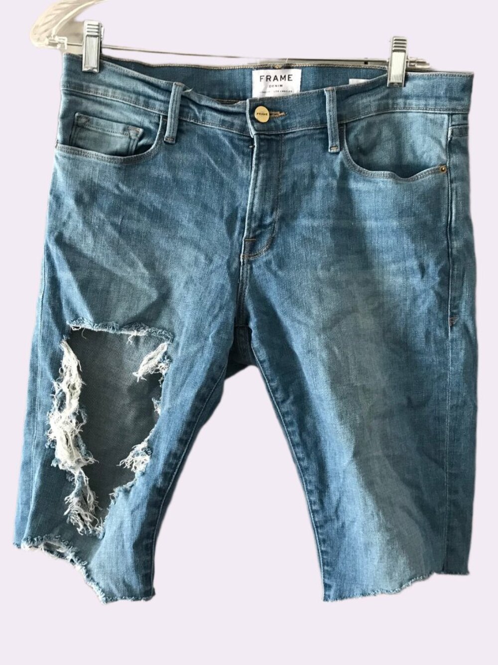 Frame denim jean ripped distressed shorts Le Garcon in medium wash blue size 29.